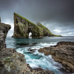 rock formation on body of water